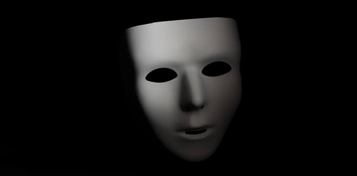 White mask in black background
